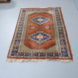 An Afghan design rug. 155x102cm.