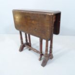 A small antique mahogany Sutherland drop-leaf table. 51x53x13cm.