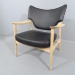 A mid-century Scandinavian design Veng lounge chair in black leather and soaped oak by Torbjorn