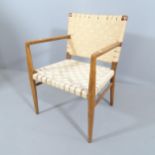A mid-century Danish teak open arm desk chair, with wool and cotton strap seat and back panels.
