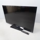 A Sony Bravia KDL-46EX723, 46 inch LCD TV, with remote control and