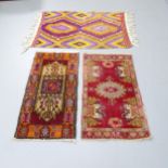 A Kilim mat, 102x72cm, and two Persian mats, 87x48cm (3)