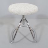 A mid-century modernist cantilever tubular steel height-adjustable stool. Lowest height 46cm,