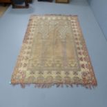 A cream ground Persian prayer rug. 192x122cm.