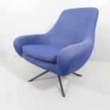 SUSANNE GRONLUND - a SoftLine Noomi blue swivel lounge chair. With sewn maker's label. Upholstery in