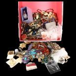 A large quantity of mixed costume brooches, necklaces etc