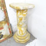 A five-section marble pedestal. 28x60cm. Top A/F.