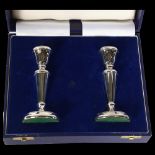 A pair of Elizabeth II silver candlesticks of small size, H12cm, hallmarks for Birmingham 1988,