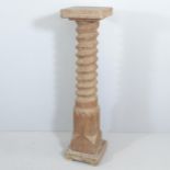 A French elm spiral turned column. Overall 34x138cm.