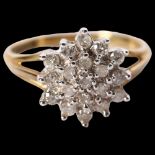 A 9ct gold diamond set flowerhead design ring, size N