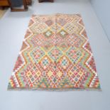 A Chobi Kilim rug. 205x130cm.