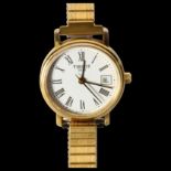 TISSOT - a lady's gold plated Tissot small-size quartz wristwatch with date aperture, and expandable