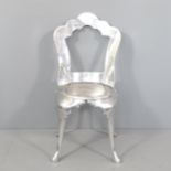 A contemporary polished aluminium Louis style chair