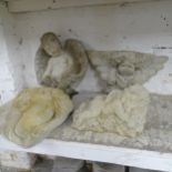 A concrete cherub wall mask, 38x27cm, two wall pockets and a cherub ornament (4).