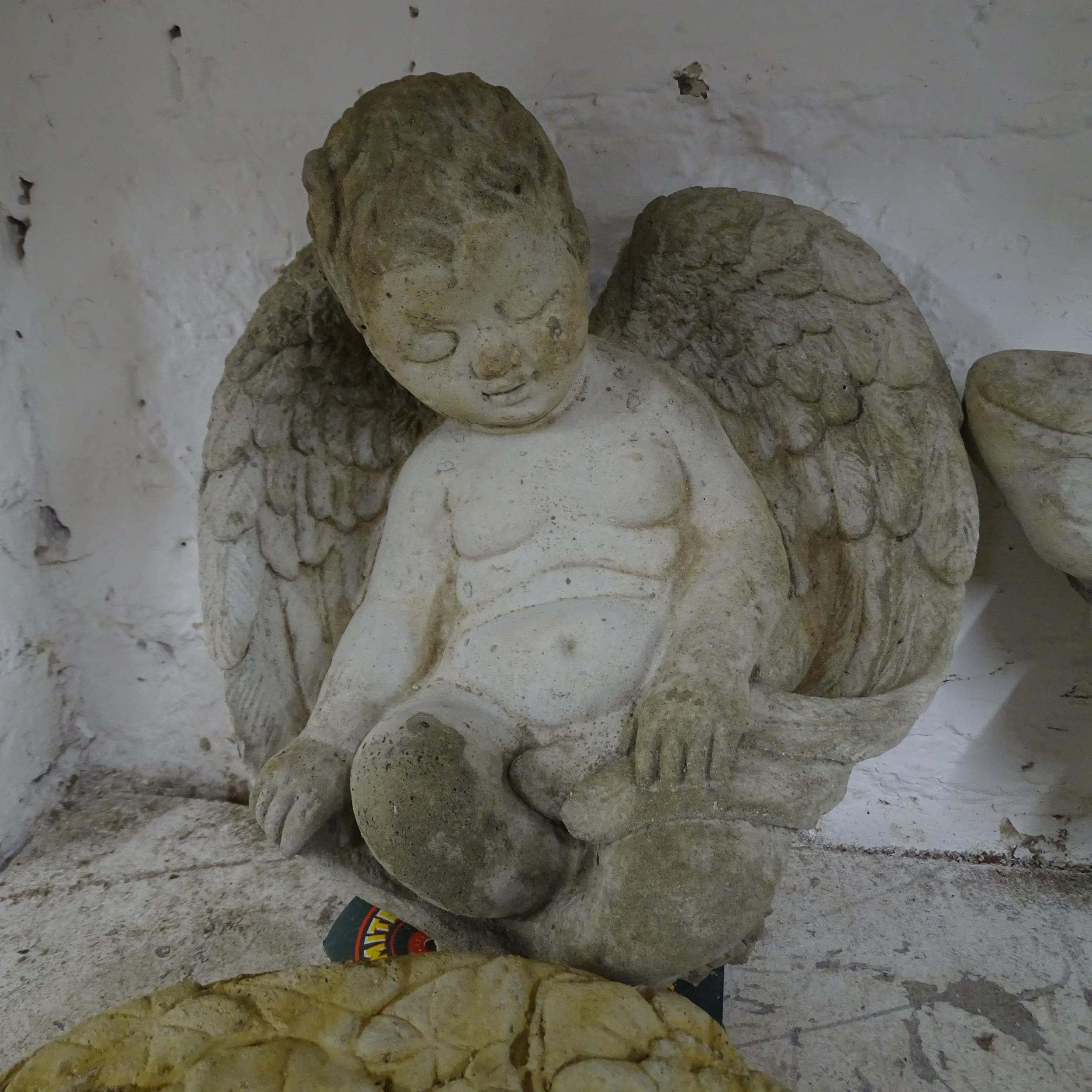 A concrete cherub wall mask, 38x27cm, two wall pockets and a cherub ornament (4). - Image 2 of 2