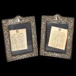A pair of Elizabeth II embossed silver-fronted photo frames, hallmarks for London 1986