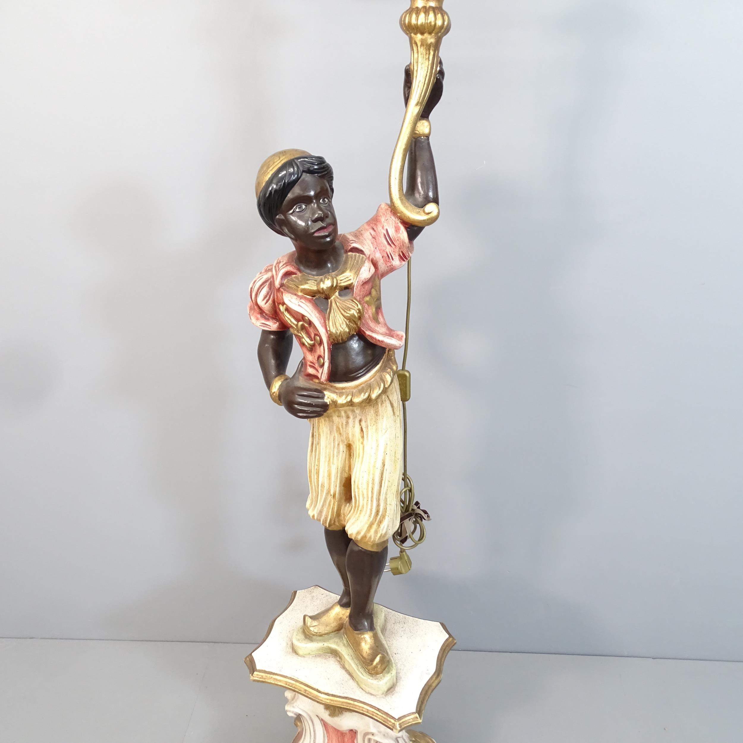 A 19th Century polychrome painted and parcel gilt Blackamoor style floor standing torchere. Height - Image 2 of 4