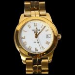 TISSOT - a unisex Tissot mid-size gold plated wristwatch (PR50), with date aperture, dial width