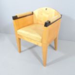 A post-modern maple and leather desk armchair in the manner of Michael Graves.