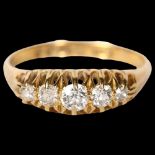 An 18ct gold five stone set diamond ring, size O