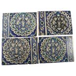 A set of 4 Islamic pottery tiles, with hand painted decoration, 20cm x 27cm (4) A few minor chips on