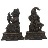 A pair of Victorian cast-iron Punch and Judy door stops, height 33cm