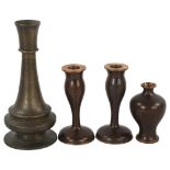 A pair of black ground cloisonne enamel candlesticks, height 13cm, a small similar cloisonne vase,