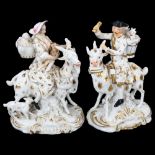 A pair of 19th century Derby figures riding goats, height 14cm
