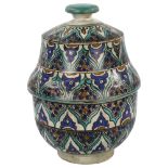 A Moroccan Islamic pottery jar and cover with hand painted decoration, height 33cm Good condition