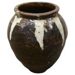 A large Burmese treacle glaze pottery jar, with white glaze streak shoulders, height 60cm Good