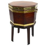 A George III brass-bound mahogany wine cooler of octagonal form, brass drop handles, on separate