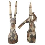 A large pair of African Kurumba Tribal antelope design headdress masks, carved and painted wood with