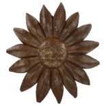 A Folk Art carved wood sun motif, diameter 56cm