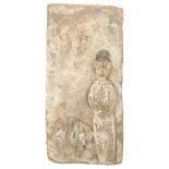 A large Chinese relief moulded pottery wall tile, possibly Jin Dynasty, height 35cm