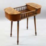 A 19th/20th century walnut work table with burr wood detail, galleried central section and 2