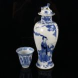 A Chinese blue and white porcelain vase and cover, decorated with children playing, 4 character
