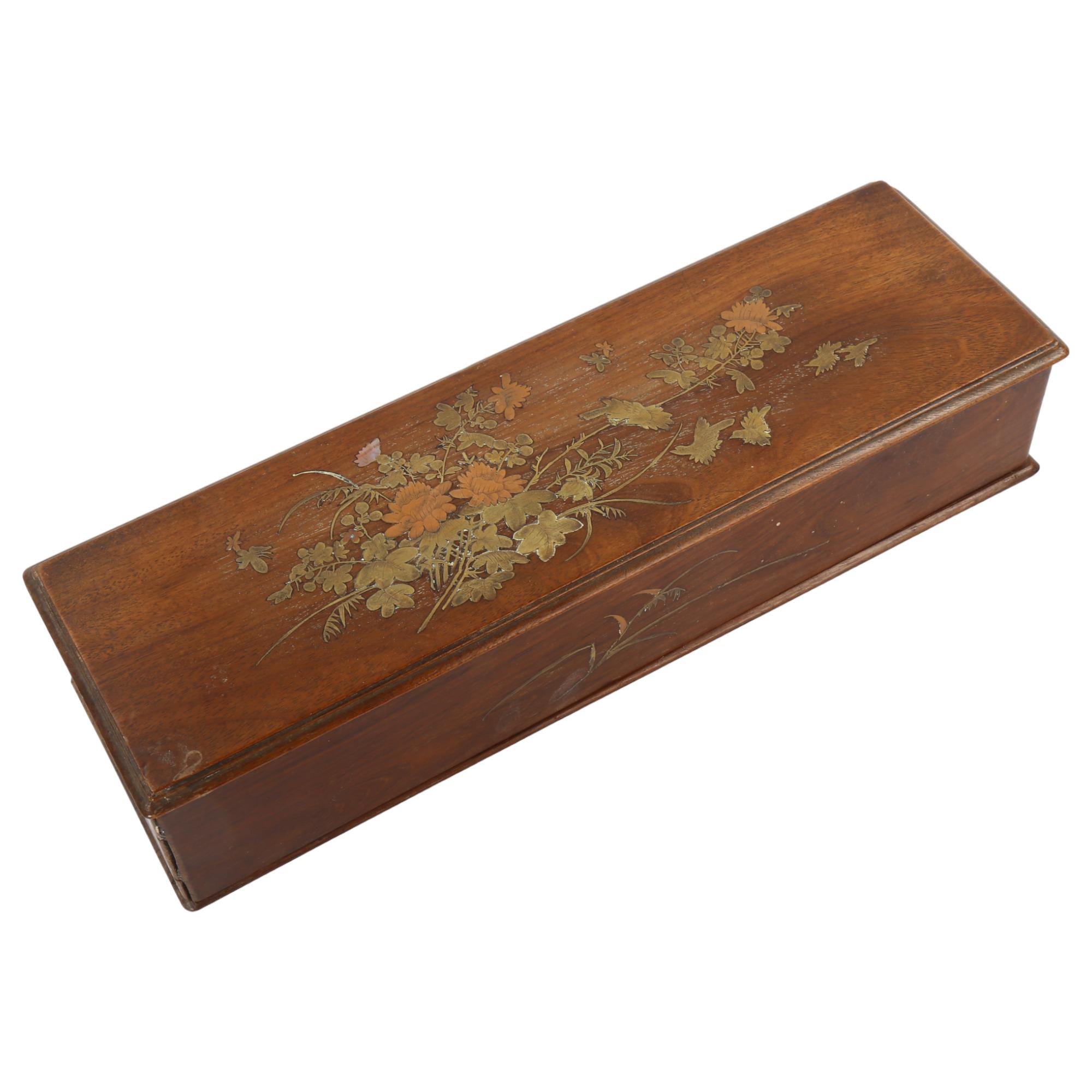 A Japanese Meiji Period hardwood box, with inlaid copper brass and mother-of-pearl decoration, 36