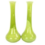 A pair of pale green glaze Art pottery narrow-necked vases, impressed maker's marks, height 40cm