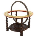 A mahogany desk-top globe stand to hold 12" globe, with transfer printed surface, diameter 44cm