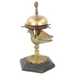 A large Victorian brass and mahogany desk-top bell, operated by a brass and mahogany ship's wheel