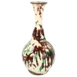 A 19th century Turkish Ottoman Canakkale pottery vase, white body with green/brown splash glaze,