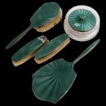 A George V Art Deco silver and green enamel 5-piece dressing table set, comprising hand mirror, 1