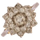 A late 20th century diamond cluster ring, unmarked white metal settings with modern round