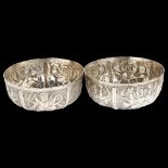 A pair of Thai white metal bowls, with relief embossed deity decoration, diameter 13cm, 12.9oz total