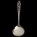 BRODRENE MYLIUS - an Art Deco Norwegian silver serving spoon, with pierced foliate handle, length