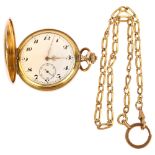 An Art Deco gold plated full hunter keyless pocket watch, white enamel dial with Arabic numerals and