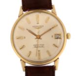 LONGINES - an American 10k gold filled Grand Prize automatic wristwatch, silvered dial with gilt