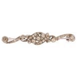 An Edwardian diamond bar brooch, unmarked white gold settings with old-cut diamonds, total diamond