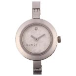 GUCCI - a lady's stainless steel 105 Series quartz bangle watch, floral diamond set silvered dial,