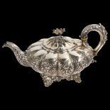 A William IV silver melon teapot, with relief embossed and chased floral decoration, flowerhead